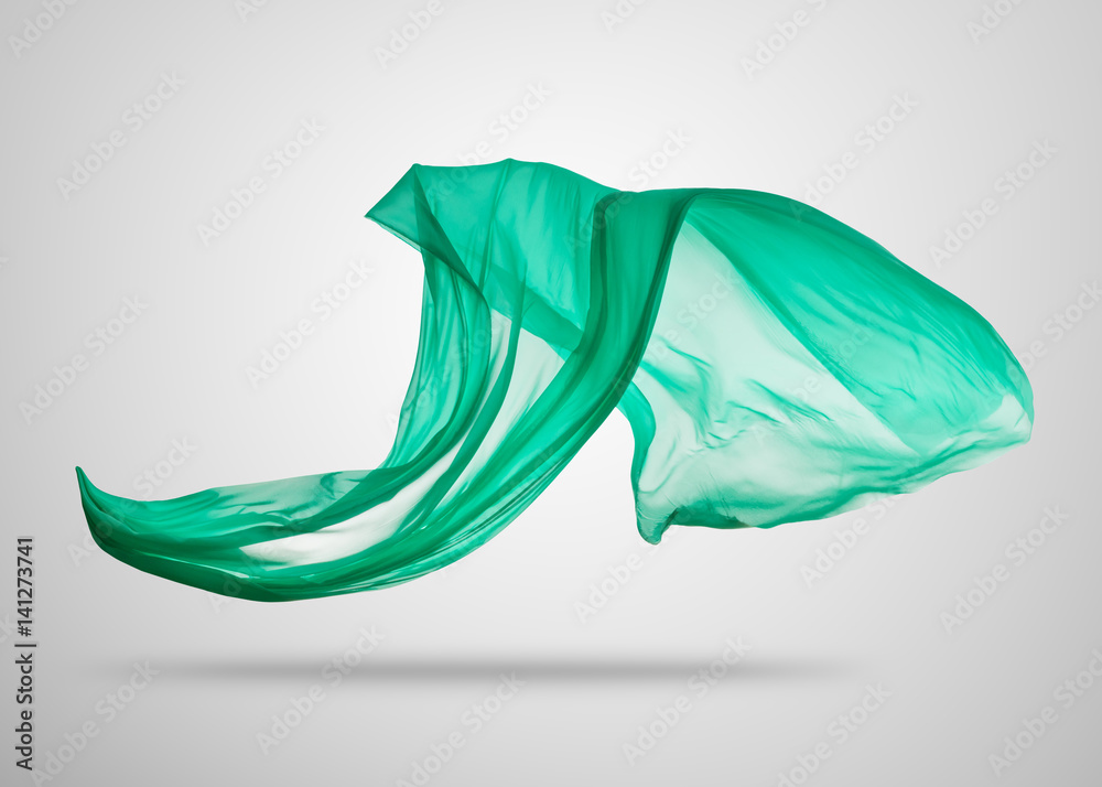 Smooth elegant green cloth on gray background