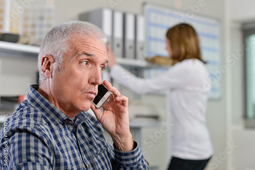 man on phone in office