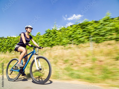 Young Woman On Mountain Bike