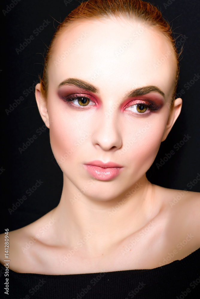 Beautiful girl with a gently pink make-up and smooth hair with a large plane Beautiful girl with a gently pink make-up and smooth hair with a large plane