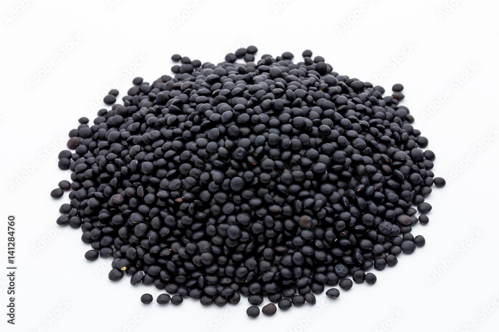 Lentin beluga. Black Lentins.Isolated on the white background. Lentin beluga. Black Lentins.Isolated on the white background.