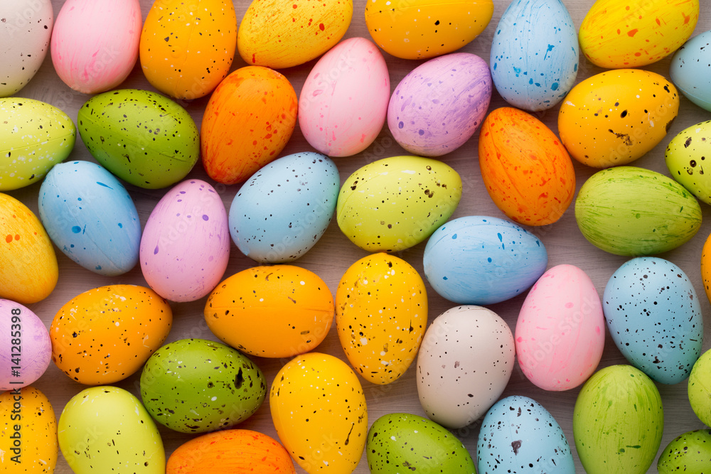 Small multicolored Easter eggs. Spring background. Small multicolored Easter eggs. Spring background.