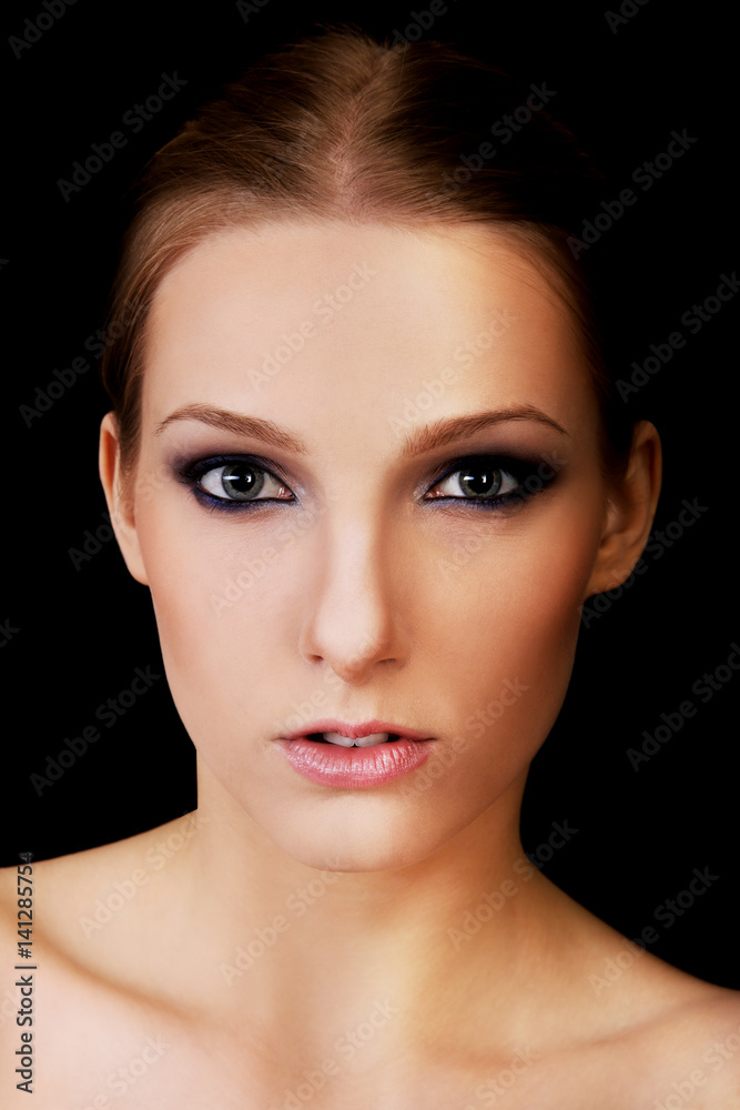 Attractive blonde topless woman with dark make up Attractive blonde topless woman with dark make up