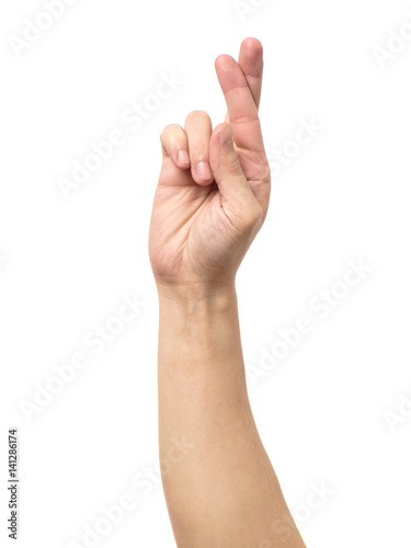 Gesturing good luck symbol fingers