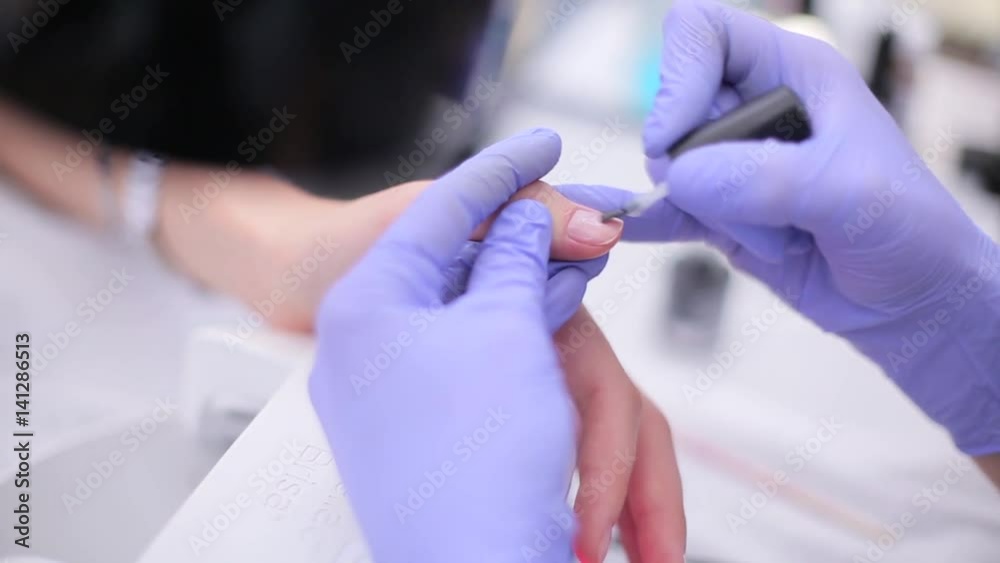 Girl nails in the manicure salon. Girl nails in the manicure salon.