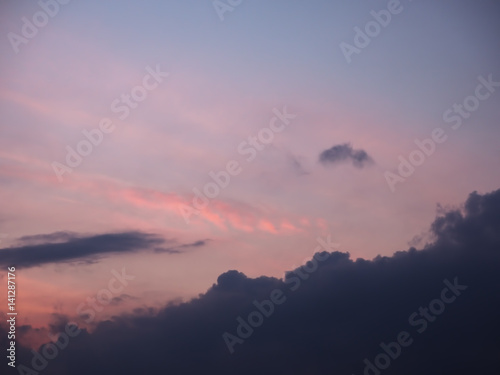 Sky blurred background the blue and pink clouds after the  sunset © Sergii Mironenko
