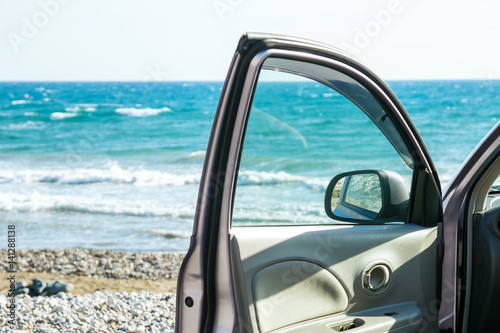 Car door and sea © blackday