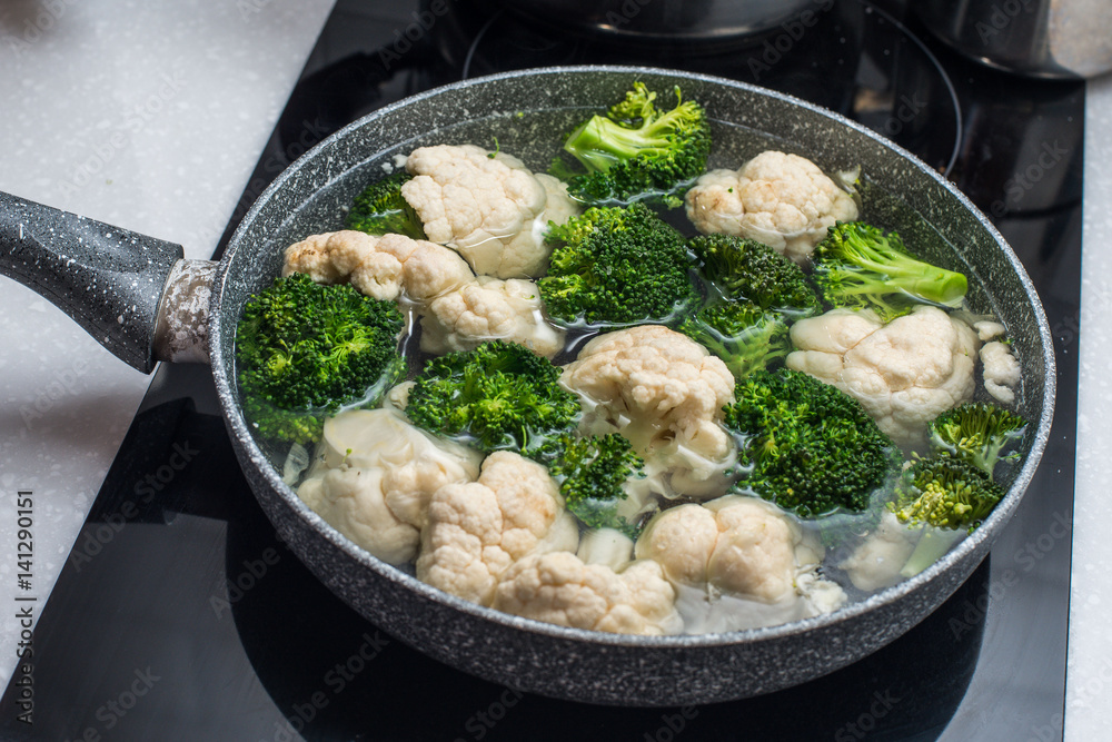 cooked broccoli and cauliflower cooked broccoli and cauliflower