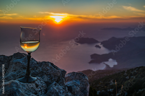 wine glass at sunset on top of baba dag mountain