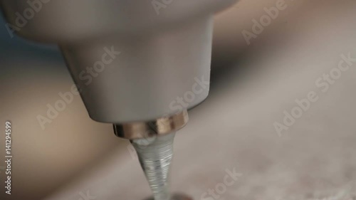 Wallpaper Mural Man twists the screw with a screwdriver. Hand close-up Torontodigital.ca