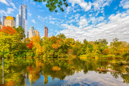 Central Park Autumn and buildings reflection in midtown Manhattan New York City © MISHELLA