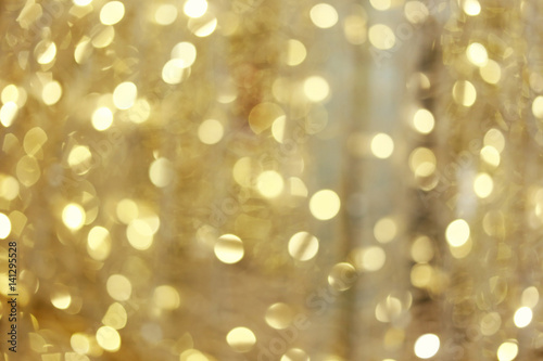 Gold Background bokeh of Christmas lights.