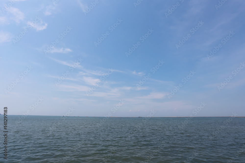 Sea and blue sky background.