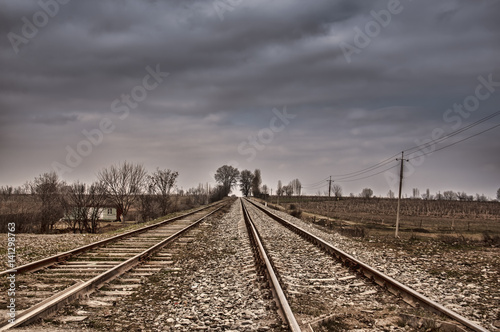 Rails (dormitories) at the electrified railway corridor. Cloudy weather. Gazakh Azerbaijan
