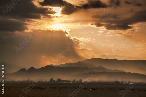 Majestic sunset in the mountains landscape. Dramatic sky clouds. Azerbaijan, Gazakh Big Caucasus