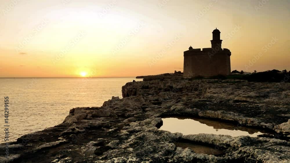 Menorca, Ciutadella, San Nicolas, defense tower at sunset Menorca, Ciutadella, San Nicolas, defense tower at sunset