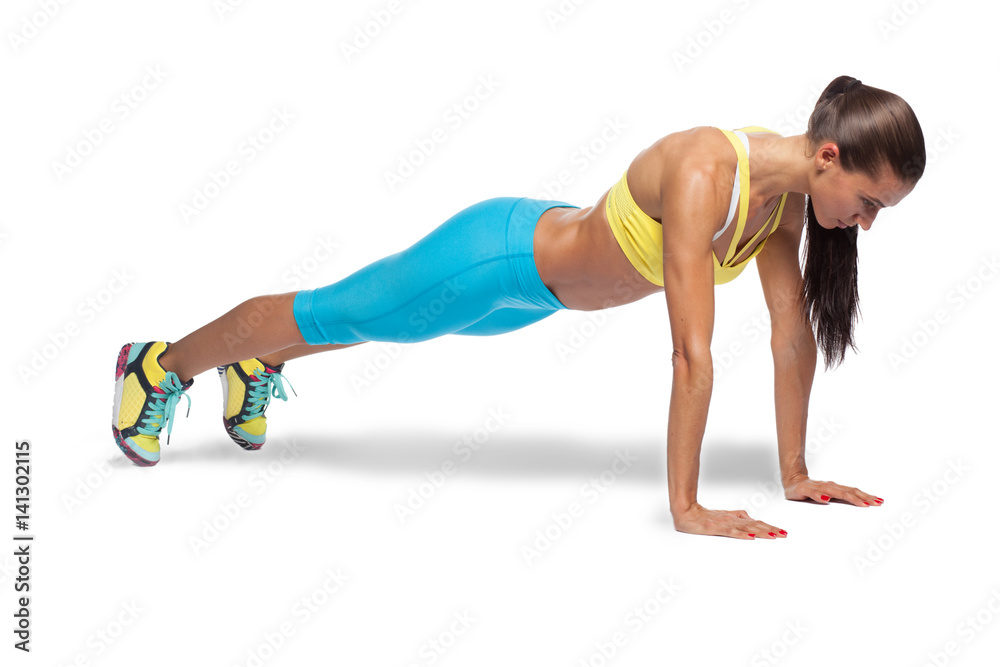 young fit woman doing fitness exercise planking isolated on white background