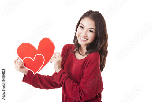 Smile woman holding heart on white background