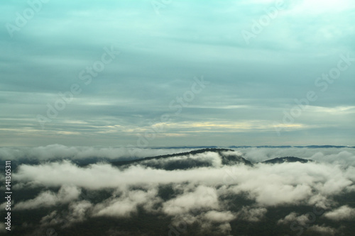 mountain landscape,morning mist with blue sky background © Alex395
