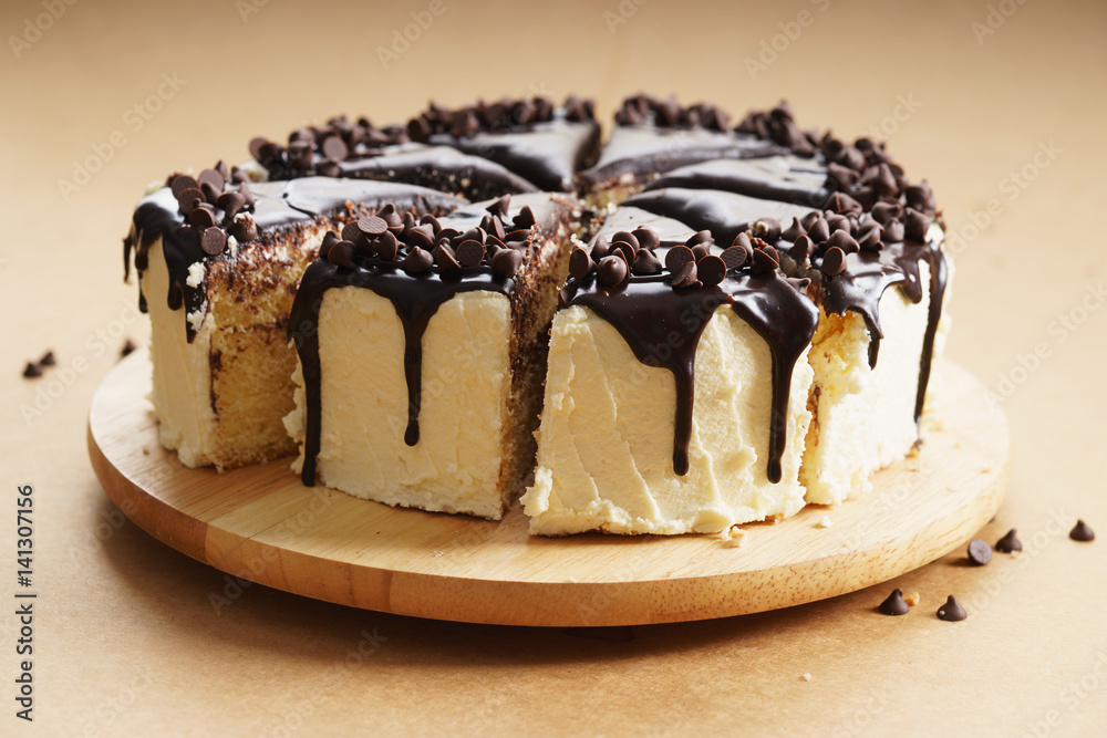 round cake with chocolate topping. round cake with chocolate topping.
