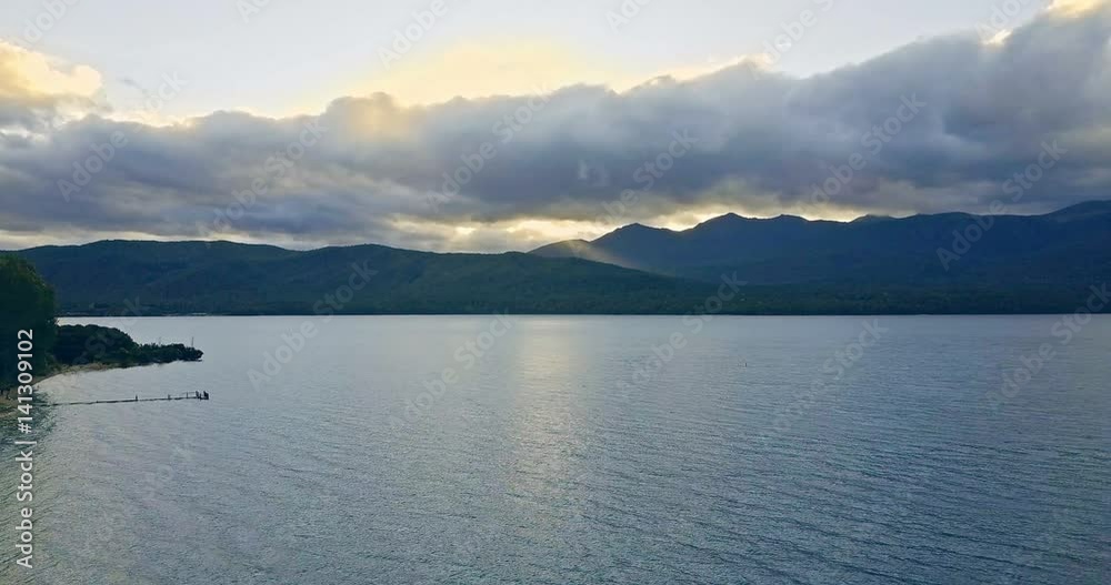 Aerial view of big lake in Te Anau at sunset, New Zealand. Aerial view of big lake in Te Anau at sunset, New Zealand.