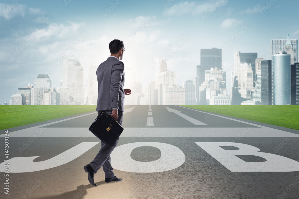 Businessman walking towards his career aspirations Businessman walking towards his career aspirations