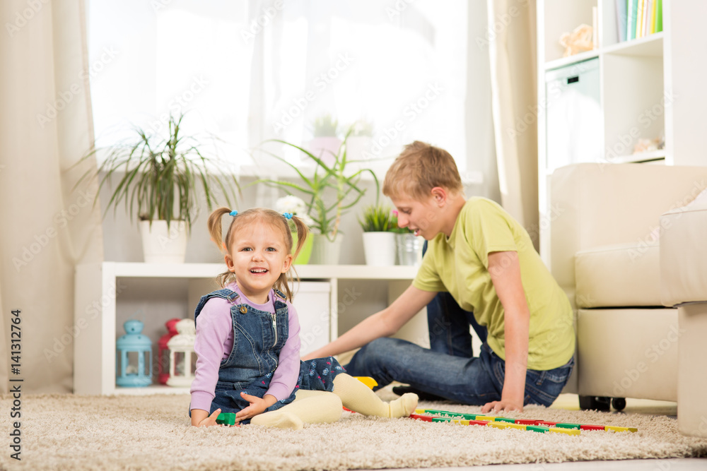 Brother and sister are playing Brother and sister are playing