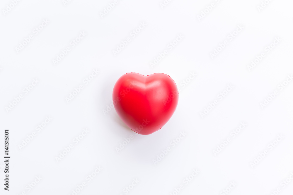 Red heart on isolated background.Top view
