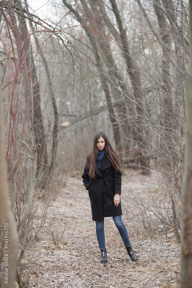 Portrait of a beautiful girl in a dark forest Portrait of a beautiful girl in a dark forest
