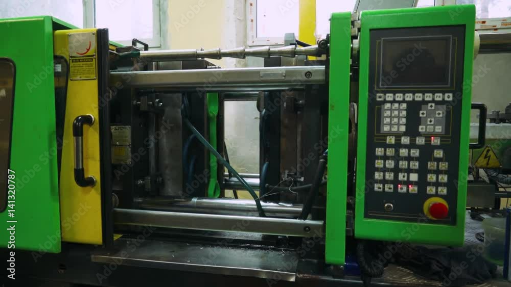 Process of press making plastic parts from the mold. Children's plastic shovels. Automatic production process. Сlose-up. 4k footage.
Process of press making plastic parts from the mold. Children's plastic shovels. Automatic production process. Сlose-up. 4k footage.