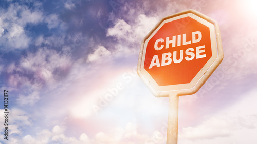 Child Abuse, text on red traffic sign
