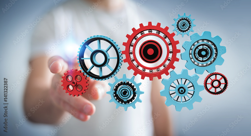 Businessman touching floating gear icons in his hand 3D rendering Businessman touching floating gear icons in his hand 3D rendering