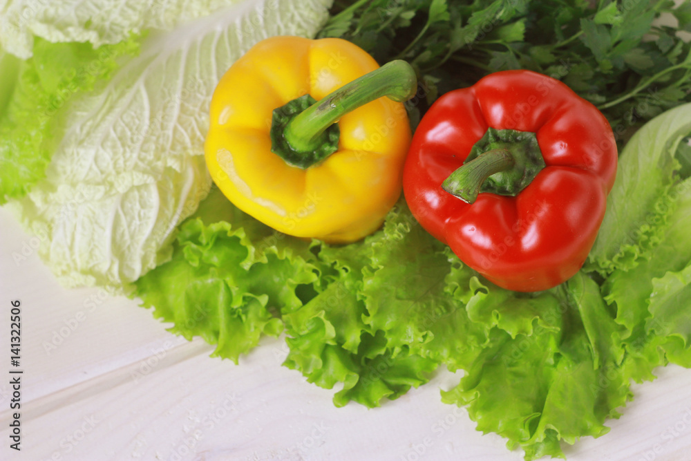 Raw vegetables and herbs: lettuce, sweet pepper, cucumber, chinese cabbage ... Concept healthy food Raw vegetables and herbs: lettuce, sweet pepper, cucumber, chinese cabbage ... Concept healthy food