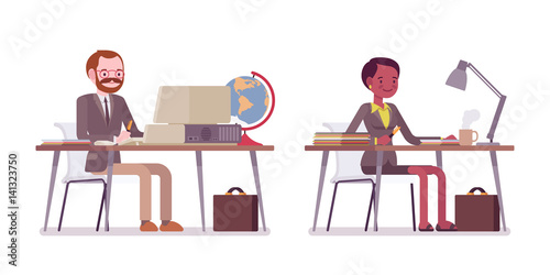 Set of male and female teacher sitting at the desk