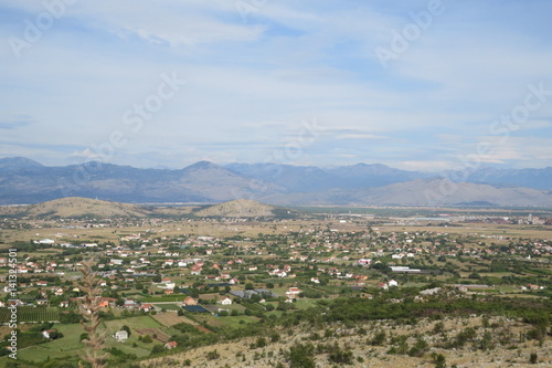 Green fields in suburban area