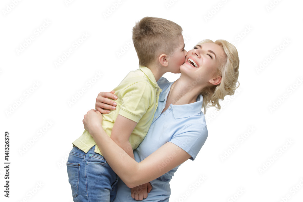 Young mother hugging son
