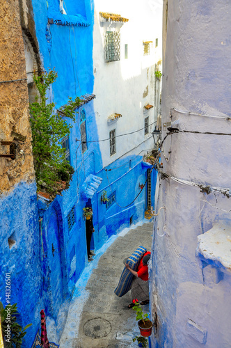 street in old Medina of the city of Shefshauen, Morokko. Bright saturated blue color © Tortuga