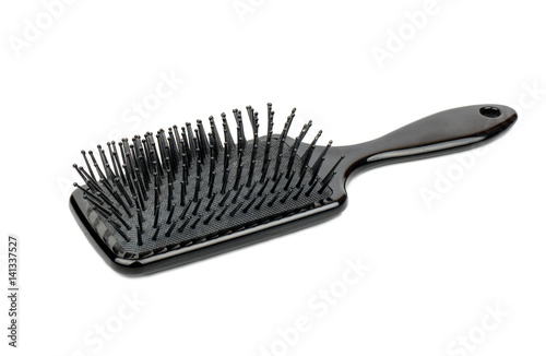 Black plastic comb isolated on white background