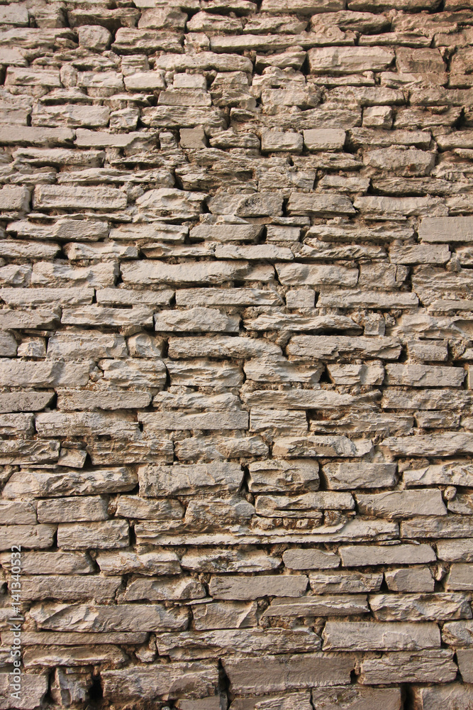 Natural grunge brown stone wall background and texture. Natural grunge brown stone wall background and texture.