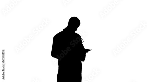 Silhouette Male medicine doctor checking his papers
