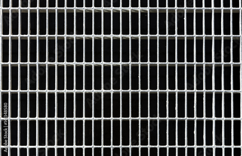 Background metal lattice of rectangular holes photo