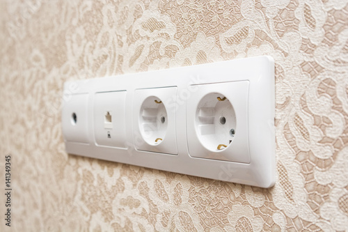 Electrical socket on a wall photo