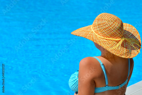 Real female beauty relaxing at swimming pool © SuperCoolPhotography