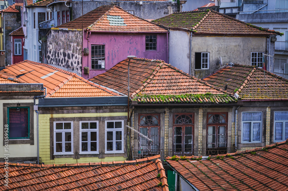 Red tiled roofs of old houses in Porto city, Portugal