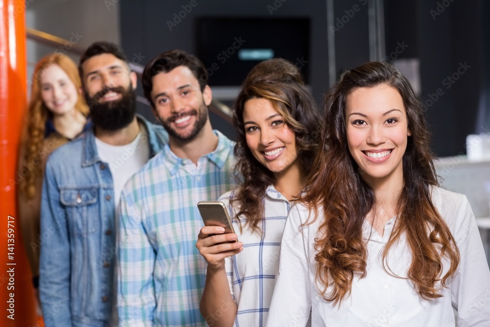 Portrait of happy male and female executives Portrait of happy male and female executives