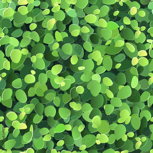 Vector seamless background with stylized green leaves