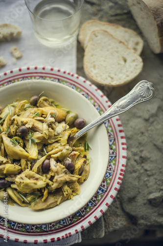 Cooked chicken with olive, lemon and rosemary