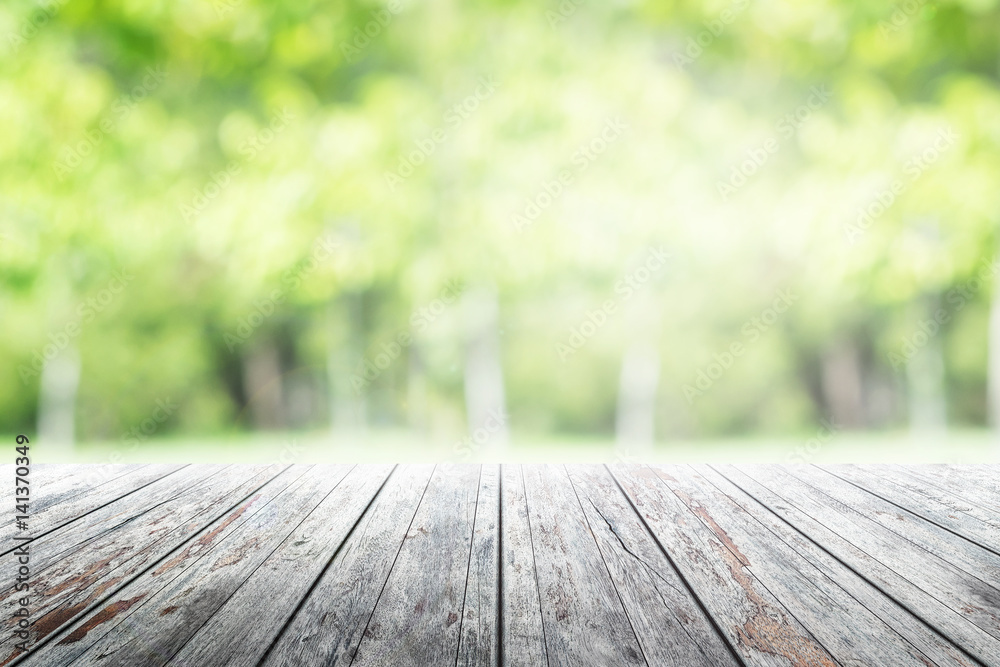 Empty wooden table with party in garden background blurred. Empty wooden table with party in garden background blurred.