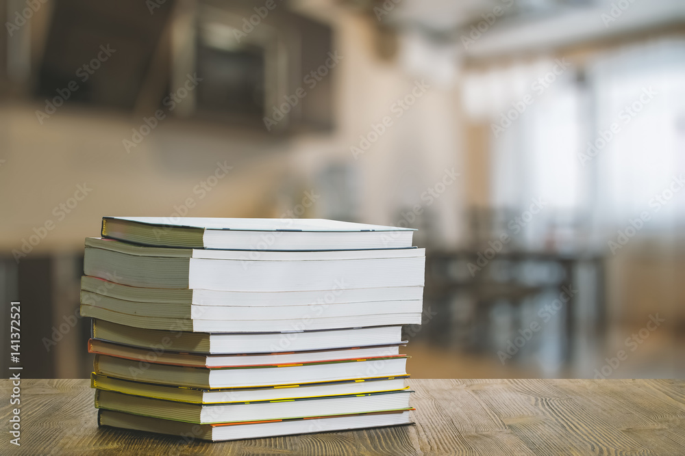 books on wooden table books on wooden table