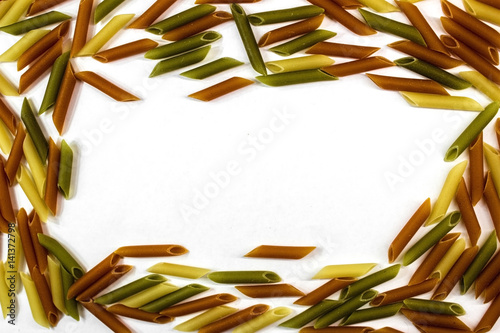 set of scattered pasta on white background, closeup, top view